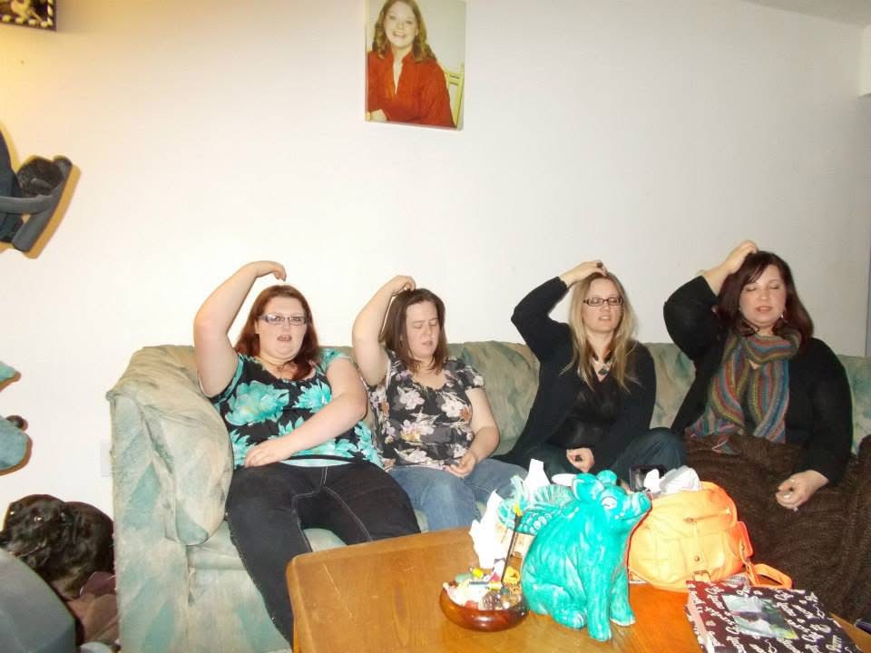 Photo of clients doing SFT tapping on the couch in Jen Ward's home