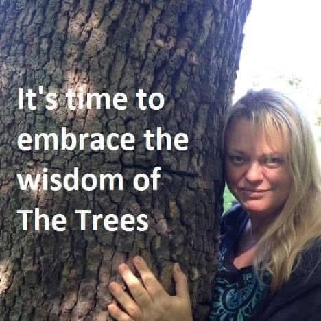 Meme of Jen Ward hugging tree with text It's time to embrace the wisdom of the trees