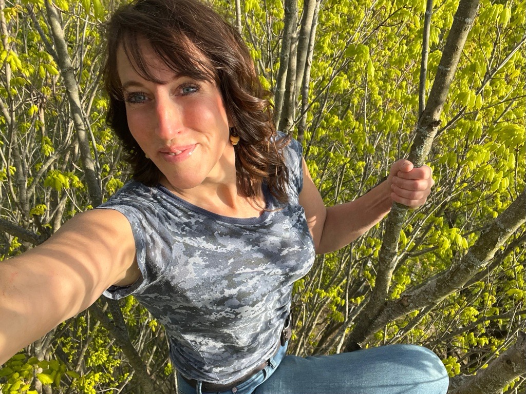 Photo of a woman in a tree